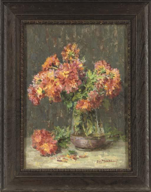 Elizabeth Whitehead - Variegated dahlias in a glass vase, on a table