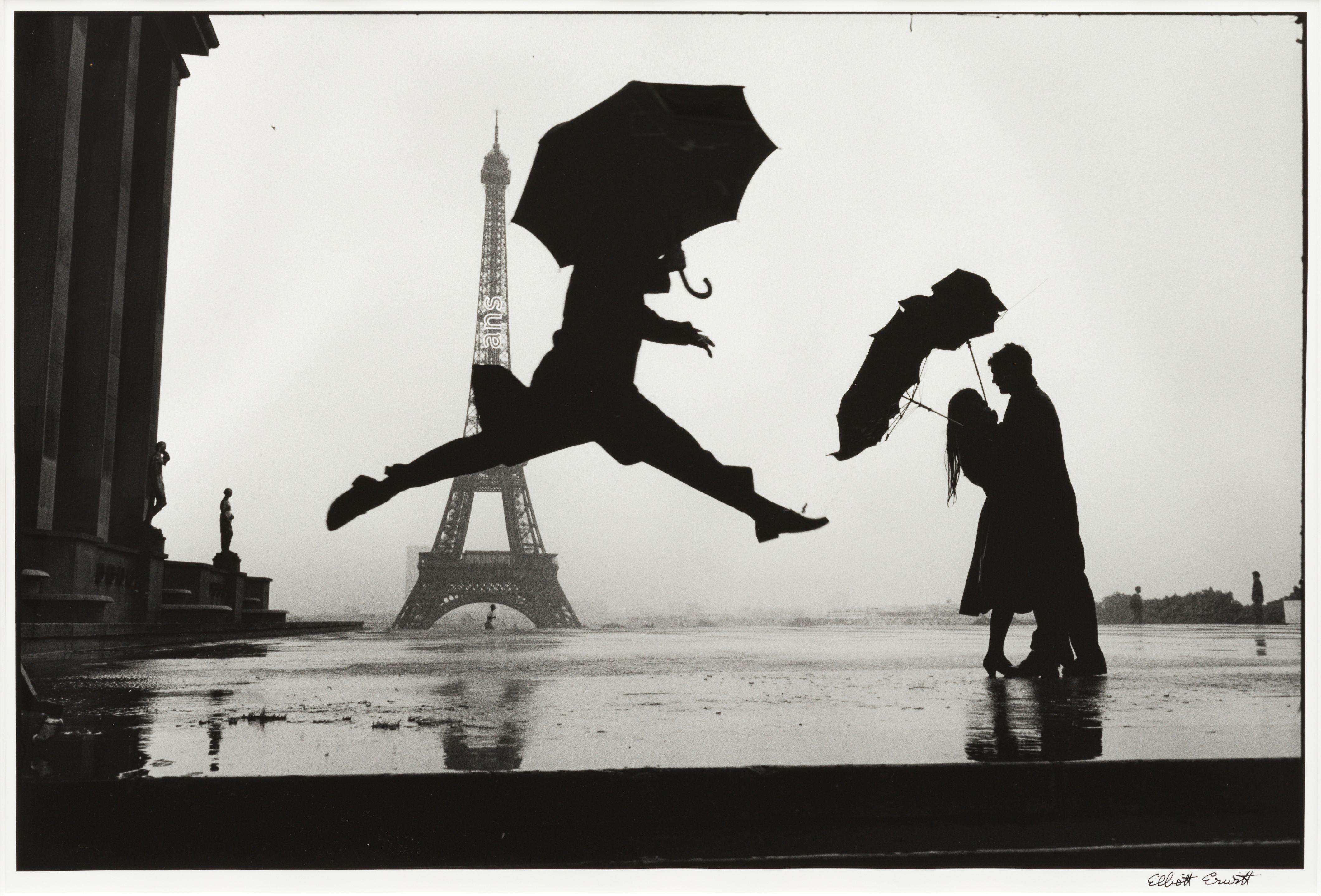 Elliott Erwitt - \'Paris\' (Umbrella Jump)