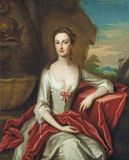 Enoch Seeman - Portrait of Anne Columbine (c.1711-1771), three-quarter-length, in a white silk dress, leaning on a draped stone ledge in a garden