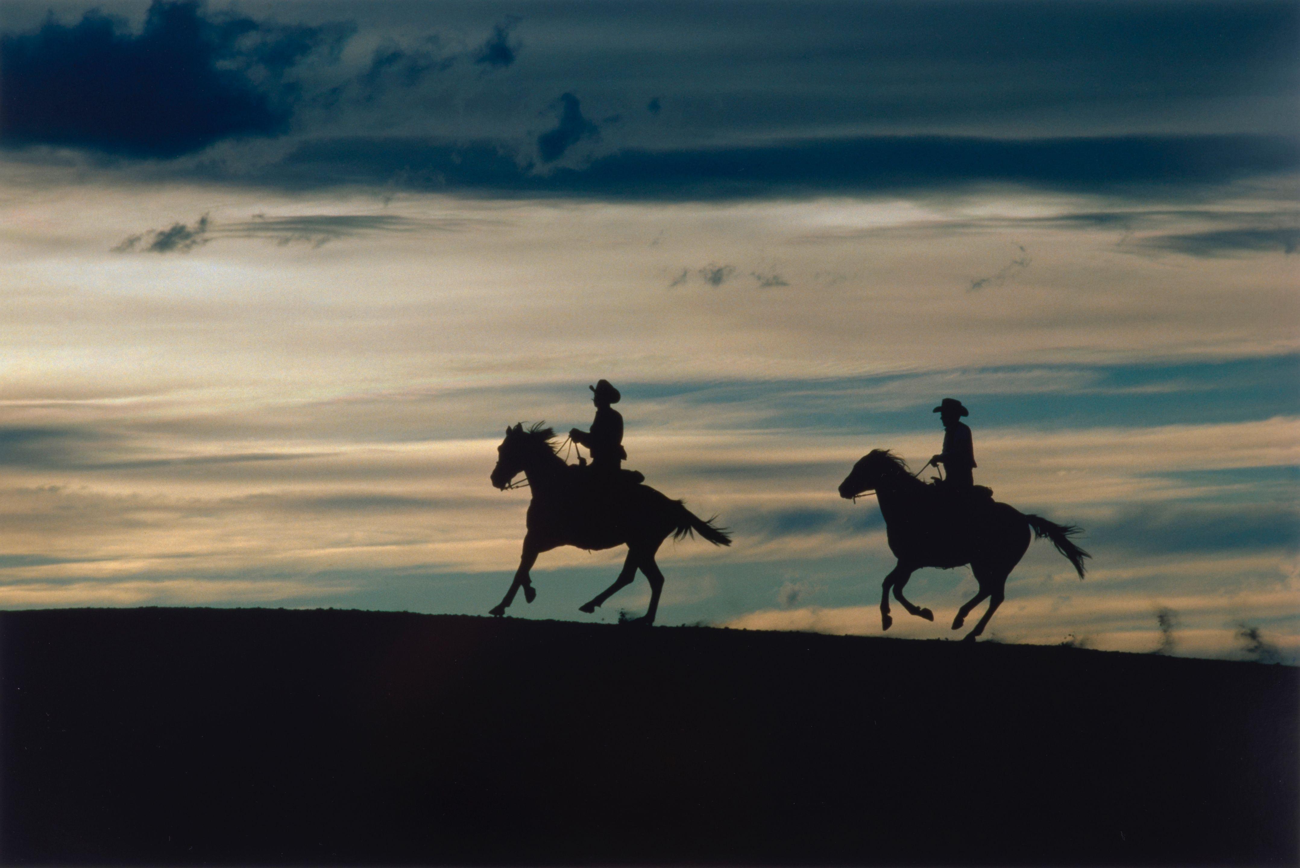 Ernst Haas - Two Cowboys at Dusk, New Mexico