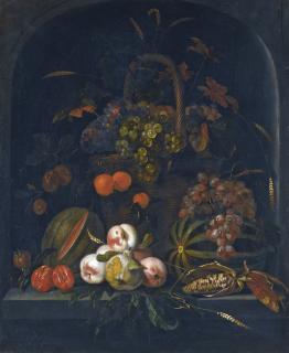 Ernst Stuven - A Still Life Of Grapes, Peaches And Corn In A Basket, On A Stone Ledge With Melons And Apricots