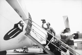 Ethan Russell - Robert Frank on the Stones 1972 tour, 1972