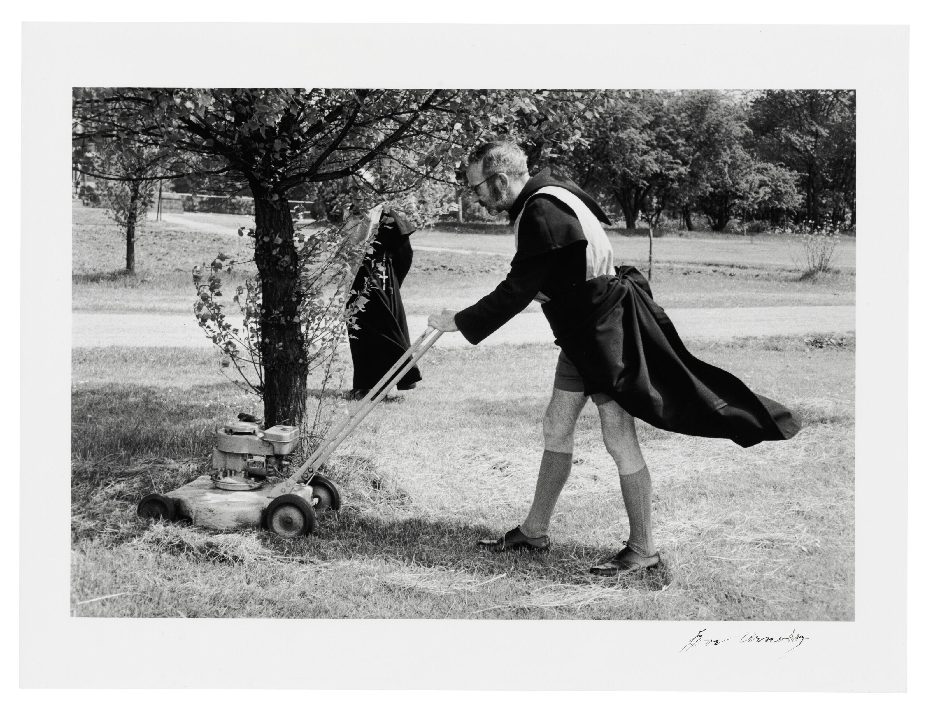 Eve Arnold, O.B.E., F.R.P.S. - Father Gregory Wilkins Mowing the Lawn, Kelham, Nottinghamshire, England, 1963