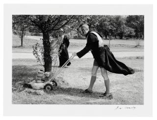 Eve Arnold, O.B.E., F.R.P.S. - Father Gregory Wilkins Mowing the Lawn, Kelham, Nottinghamshire, England, 1963