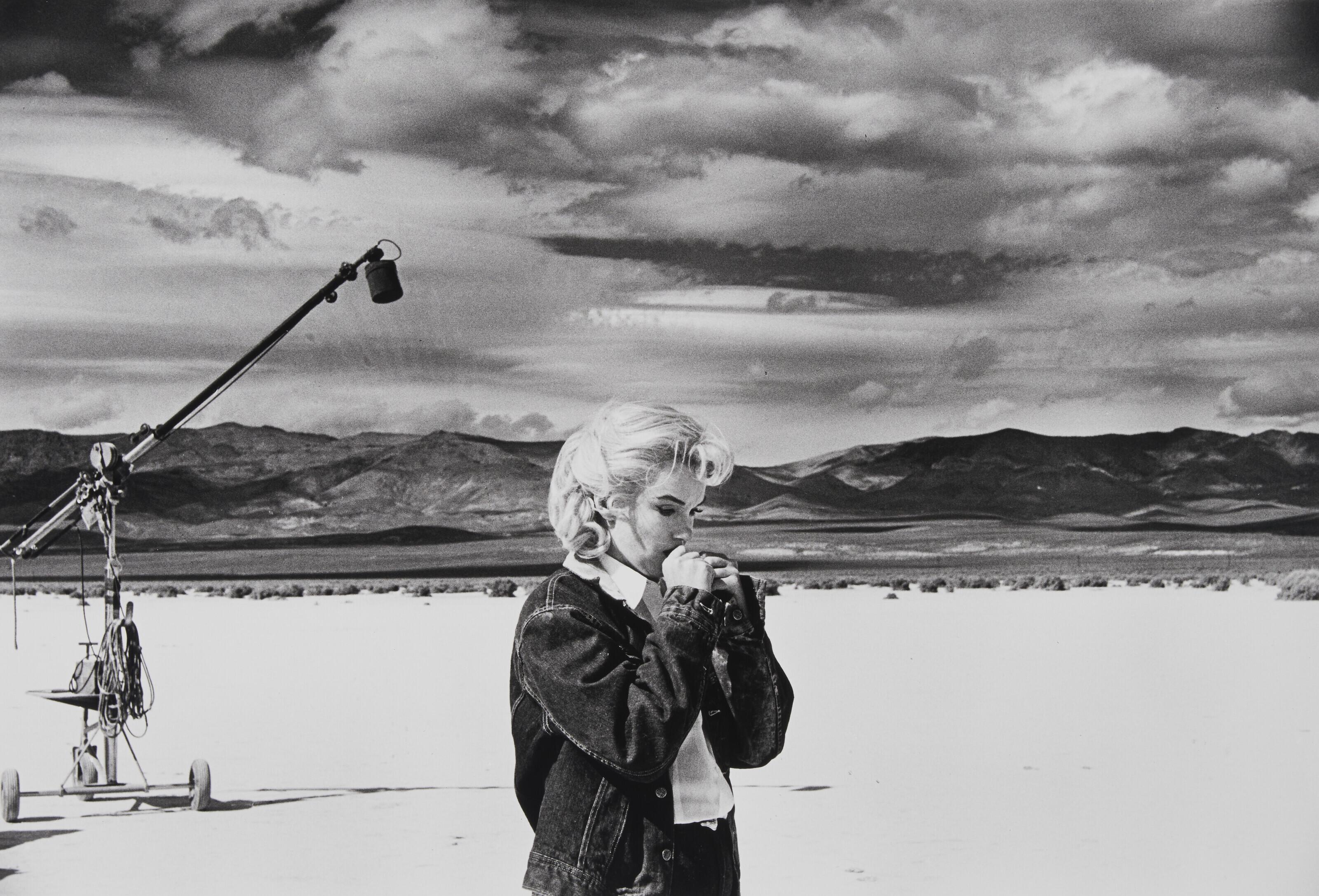 Eve Arnold - Marilyn Monroe during filming of The Misfits in the Nevada desert rehearsing lines for a scene with Clark Gable, 1960
