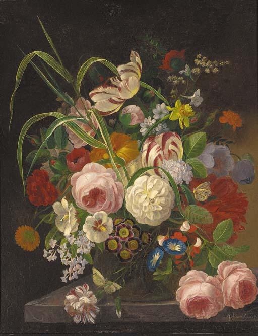 F. Van Geit - Peonies, tulips and other summer flowers in a glass vase on a stone ledge
