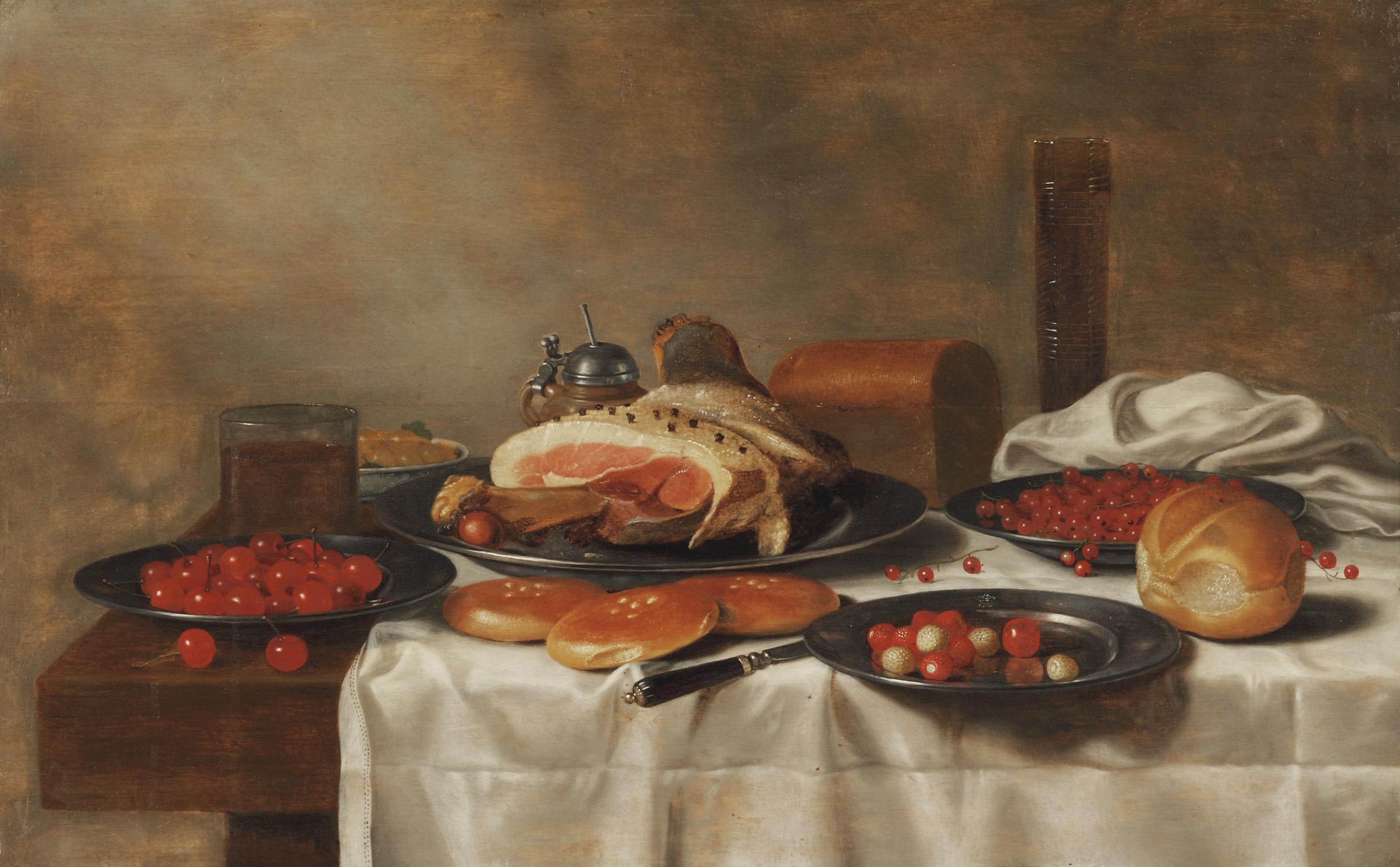Floris van Schooten - A ham on a silver plate, a glass of beer, a mustard pot and white grapes on a porcelain plate, cherries, strawberries and red currants on silver plates, rolls of bread, a knife and a \'pasglas\', all on a partially draped table