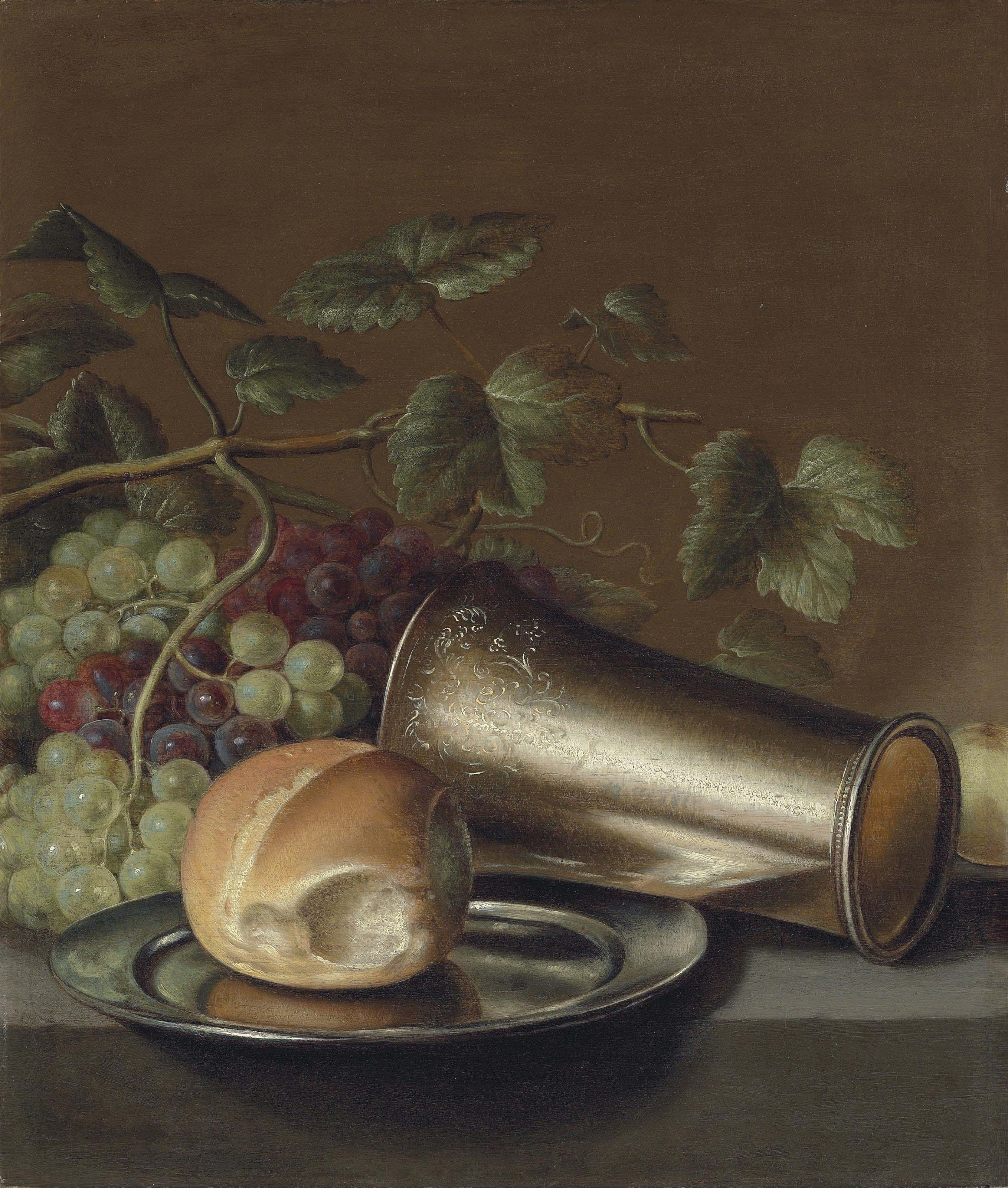 Floris van Schooten - Bread on a pewter platter, an engraved silver cup, with grapes and a plum on a stone ledge