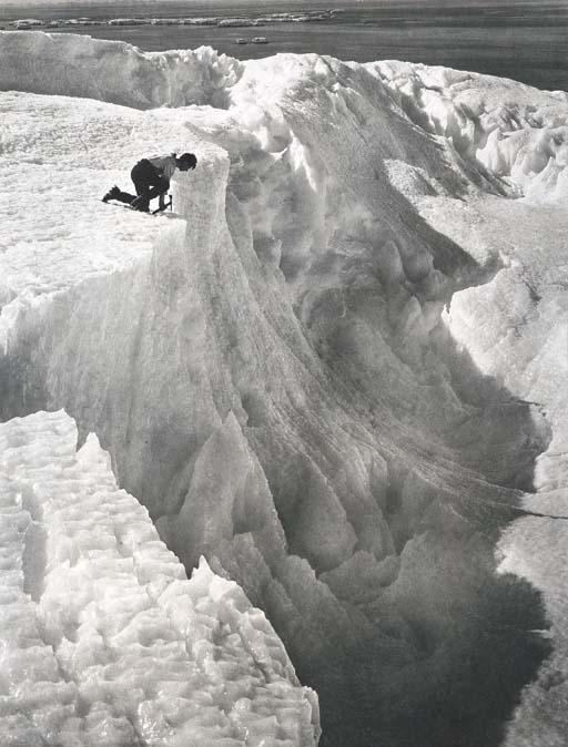 Frank Hurley - Correll on the edge of a Ravine in the ice-sheet, Adelie Land