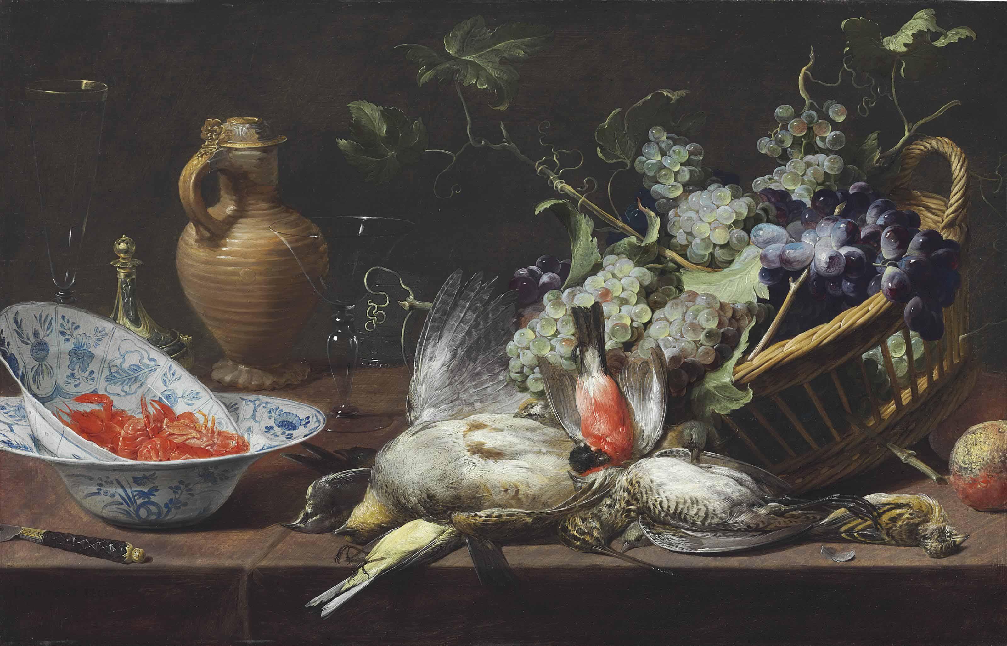 Frans Snyders - A Partridge, Snipe, Sparrow, Finch, And Other Birds With A Basket Of Grapes And Langoustines In Wan-Li Kraak Porcelain Bowls, A Mounted Stoneware Jug, Saltcellar, And Glasses On A Tabletop