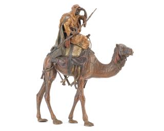 Franz Bergman - A cold painted bronze Orientalist figural group of an Arab warrior seated on a camel