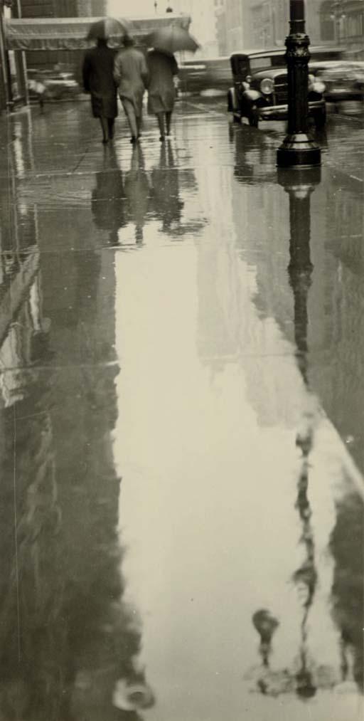 Fred Zinnemann - Rainy Street, New York, Three Figures, 1932