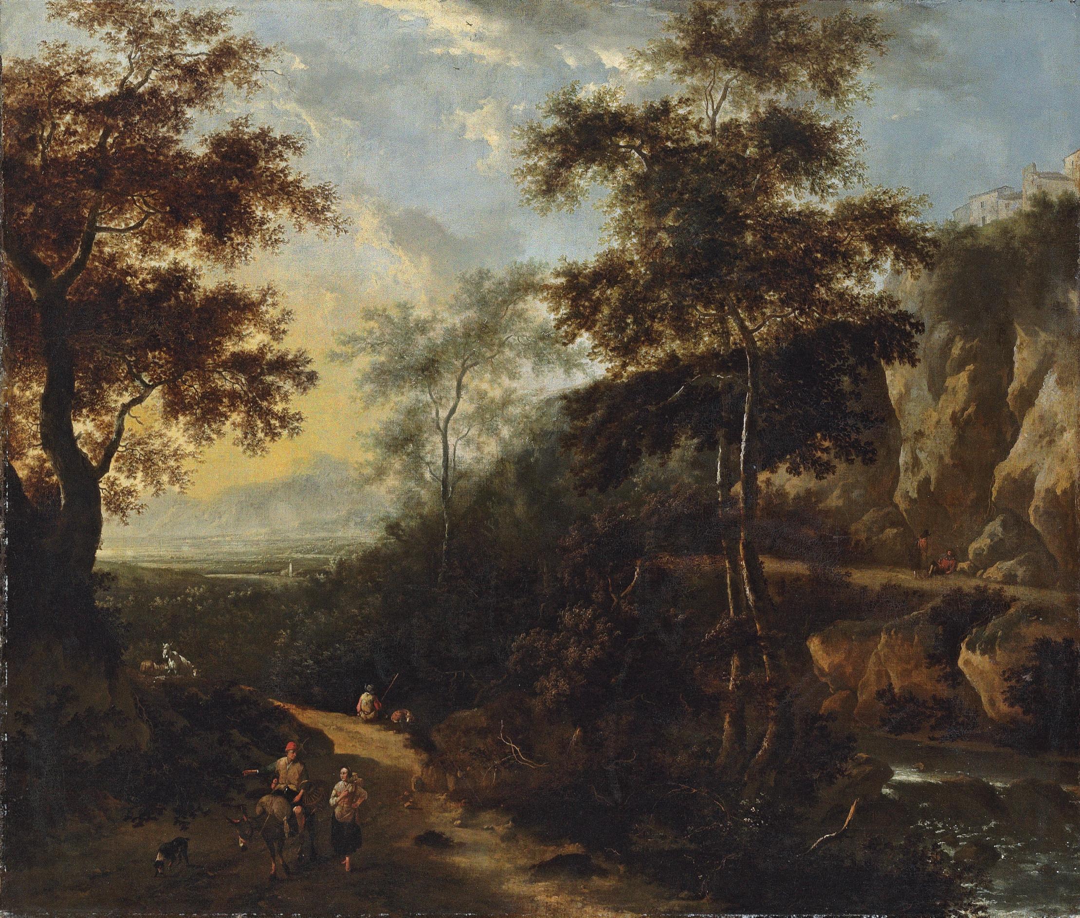 Frederik De Moucheron - An extensive Italianate landscape with travellers on a wooded track