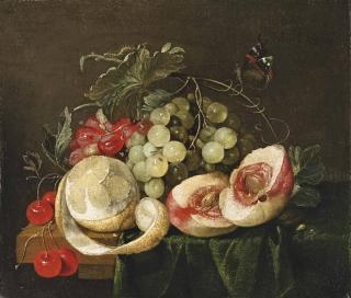 G. van Deynum - A peeled lemon, open peach, grapes and cherries, with a butterfly, on a partly-draped table