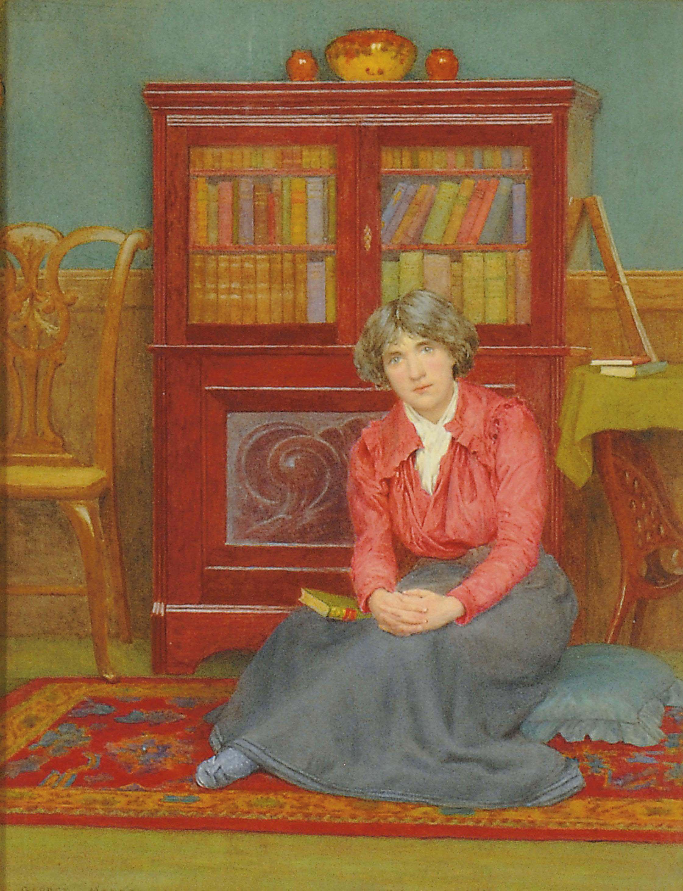 George Marks - A lady, seated small full-length, with a book on her lap in an interior