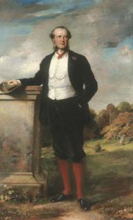 George Richmond, R.A. - PORTRAIT OF BEILBY RICHARD LAWLEY, 2ND BARON WENLOCK, FULL-LENGTH, IN A BROWN SUIT WITH A WHITE WAISTCOAT, STANDING ON THE TERRACE AT ESCRICK HALL