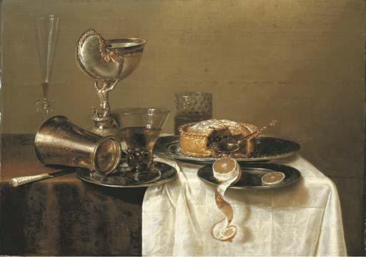 Gerrit Willemsz. Heda - An overturned silver tumbler and a roemer on a pewter plate, a façon-de-Venise wineglass, a nautilus cup, a pie and a partly-peeled lemon on pewter plates on a partly-draped table