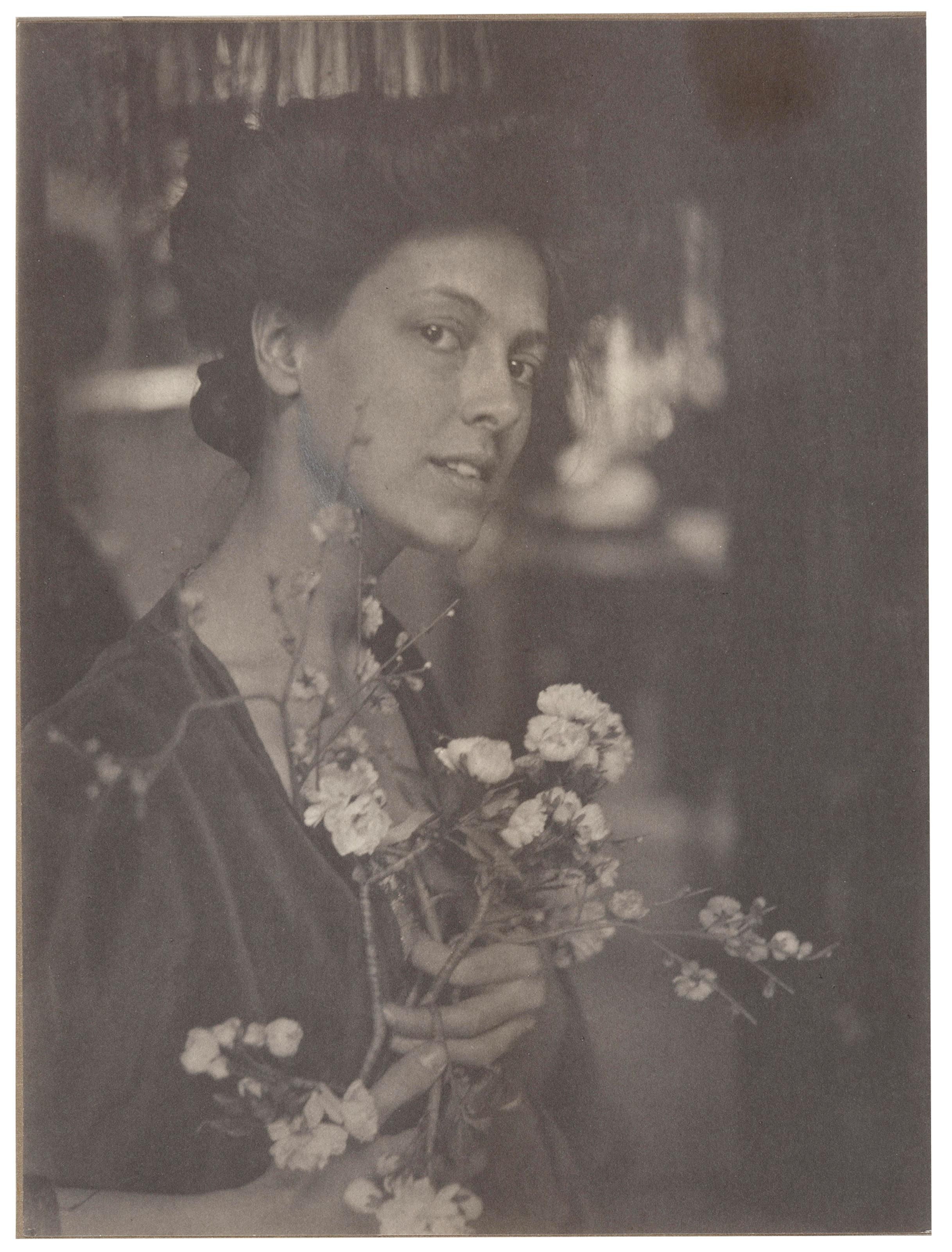 Gertrude Käsebier - Untitled (Portrait of a woman with cherry blossoms), c. 1905