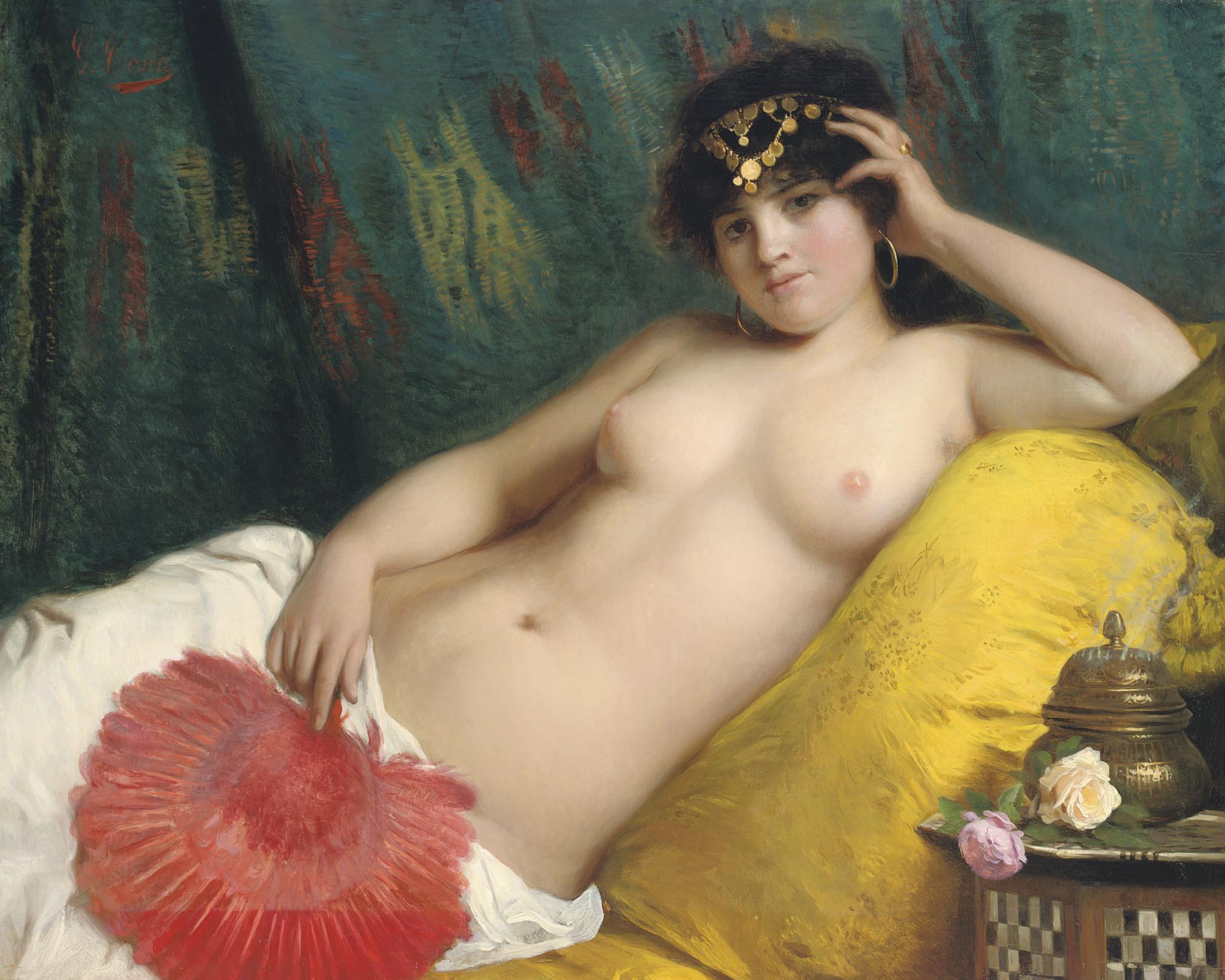 Giovanni Costa - An odalisque with a red fan