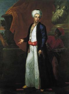 Giuseppe Bonito - Portrait of a gentleman, full-length, in Ottoman robes, a page beside him, on a terrace before a Solomonic column
