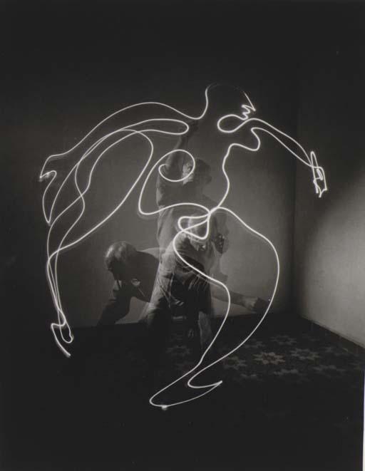 Gjon Mili - Triplet of Picasso Drawing With Light, 1949