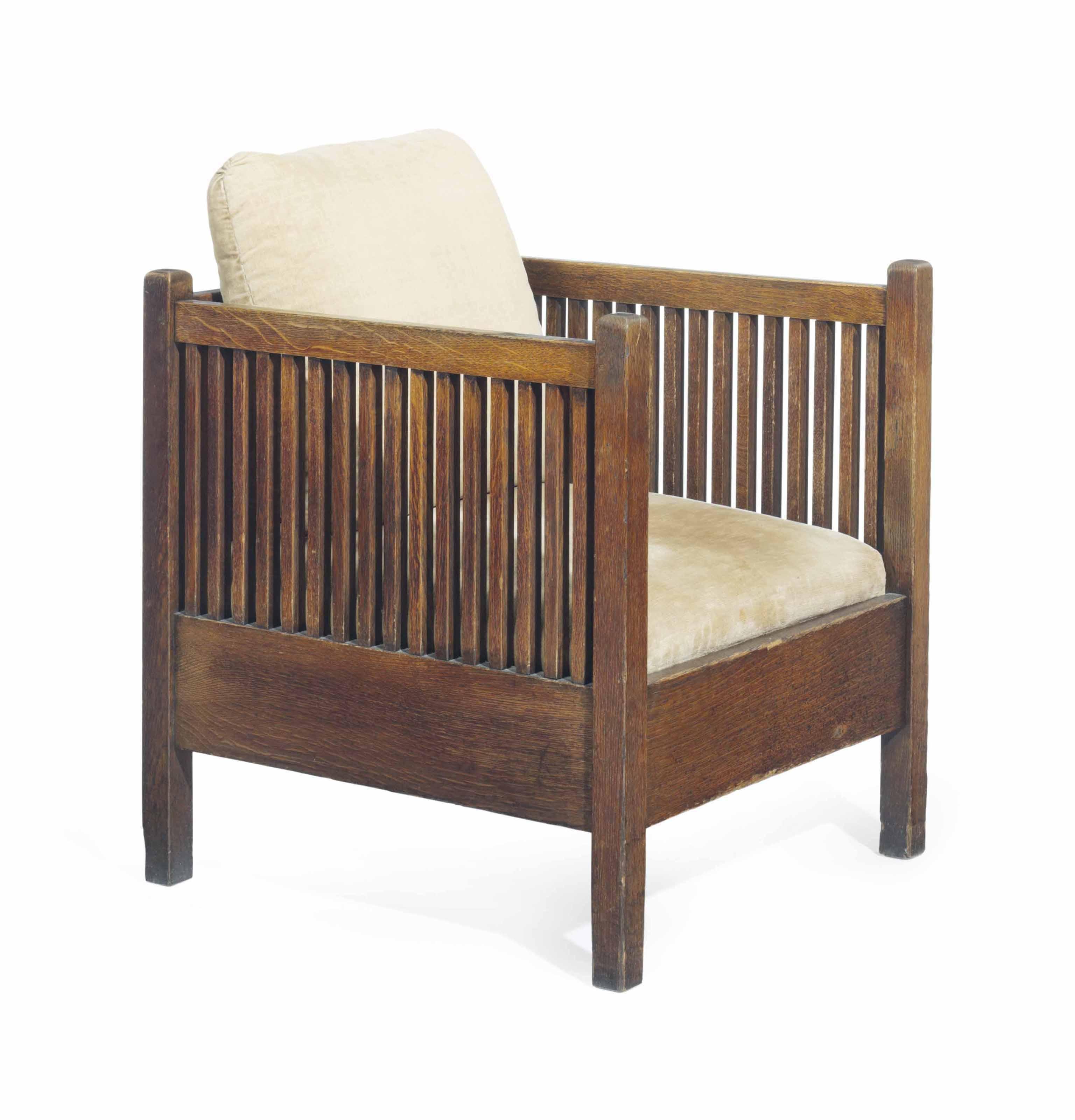 Gustav Stickley - AN ARMCHAIR, CIRCA 1909