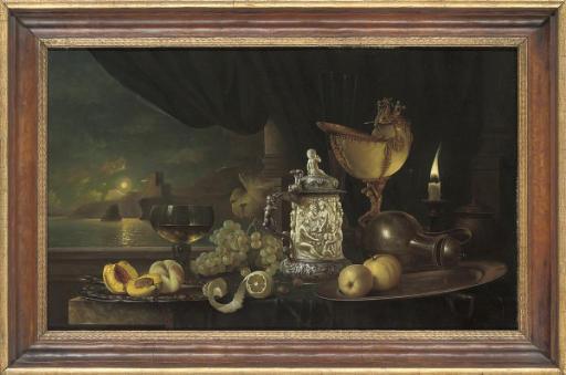 Gyula Bubárnik - Peaches on a silver platter, with a römer, grapes, lemon, silver mounted ivory tankard, jug and a candle, on a stone ledge, a moonlit seascape beyond