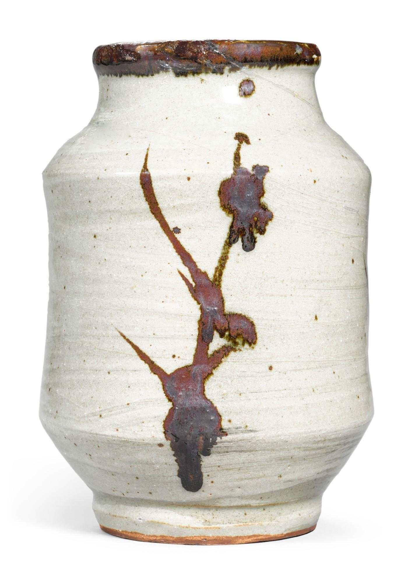 Hamada Shōji - the stoneware vase of red clay body, brown glaze and hakeme white glaze depicting abstract grass and reed design, circa 1960