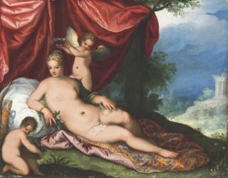 Hans Rottenhammer I - Venus reclining in a wooded landscape, attended by putti