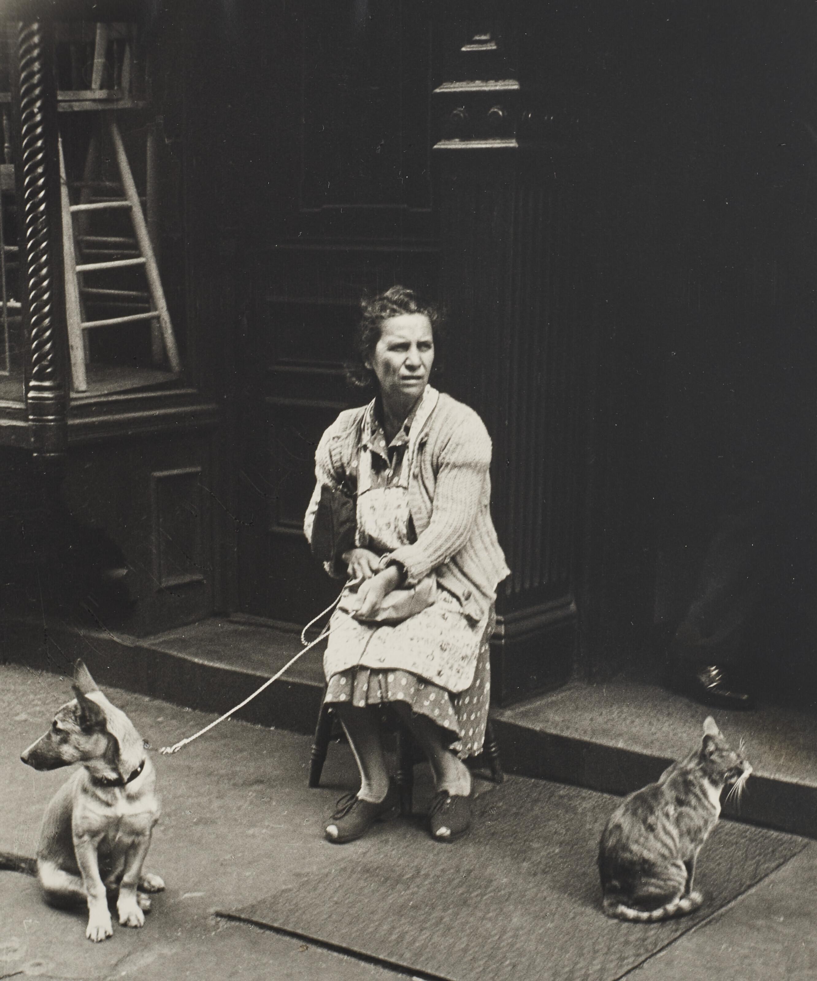 Helen Levitt - New York City (woman with cat and dog), 1940
