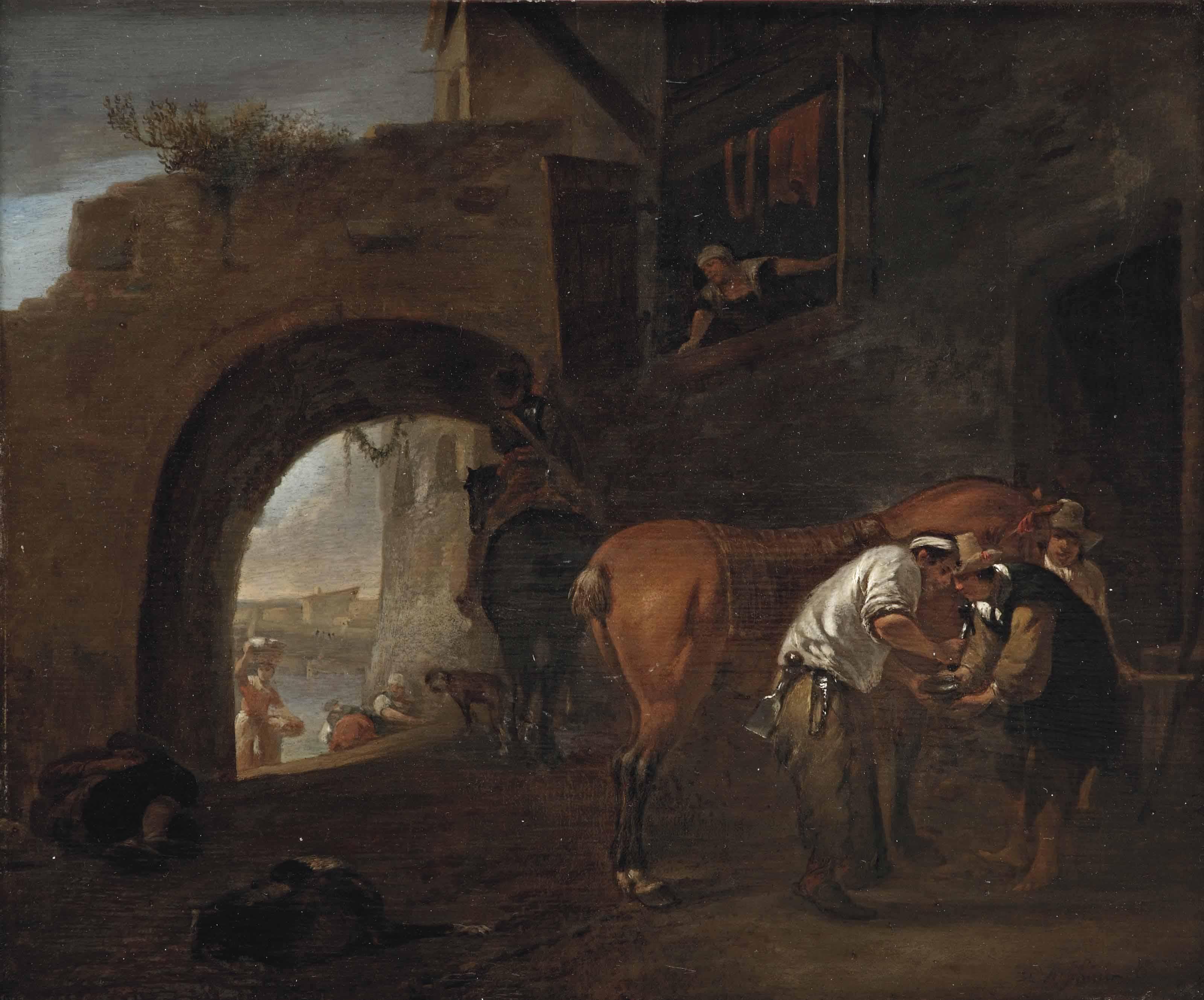 Hendrick Verschuring - A blacksmith on the outskirts of a city wall, an Italianate river landscape beyond the archway