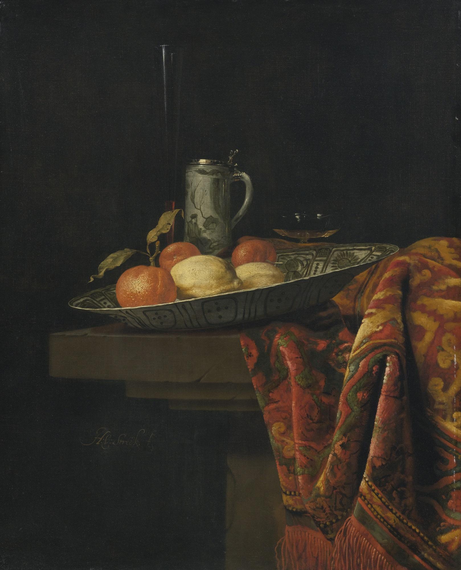 Hendrik Van Streek - Still Life Of Fruit In A Blue And White Porcelain Bowl With Other Objects Resting On A Stone Ledge Draped With An Oriental Carpet