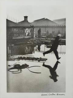 Henri Cartier-Bresson - Behind The Gare St.-Lazare