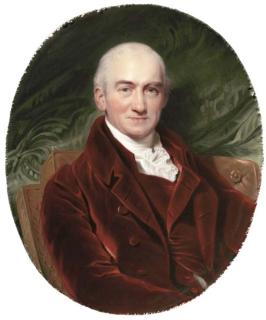 Henry Bone, R.A. - John Howard, 15th Earl of Suffolk and 8th Earl of Berkshire (1776-1820), seated in a brown upholstered chair, facing right in maroon velvet coat and waistcoat and frilled cravat, green curtain background