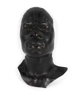 Herbert Ward - A patinated bronze of a native African man, modelled as a mask the forehead with scarification marks