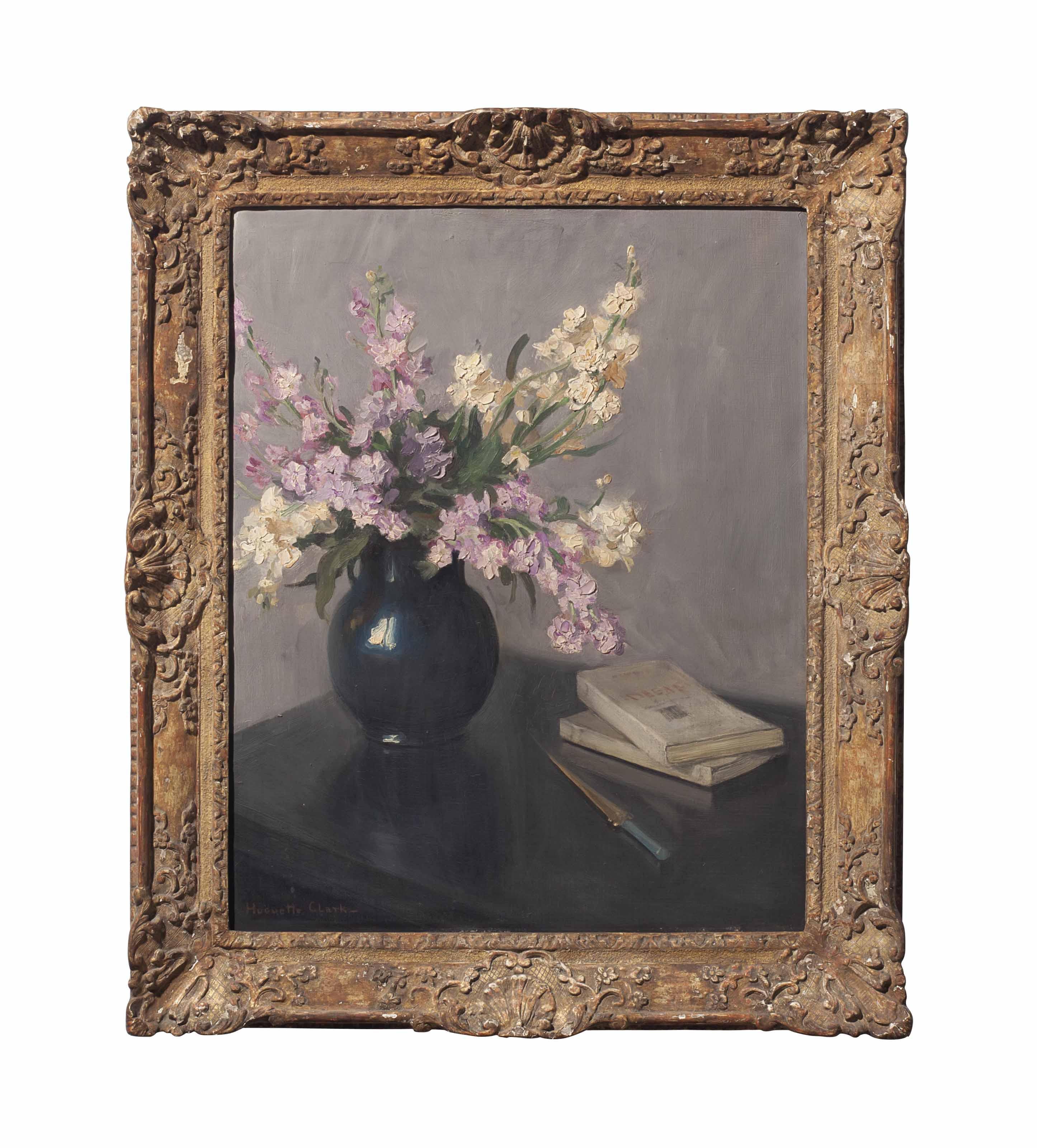Huguette Clark - Still life of a vase of stocks in a blue vase on a table with two books and a letter opener