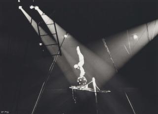 Ilse Bing - Circus Acrobat On Black Ball, New York, 1936