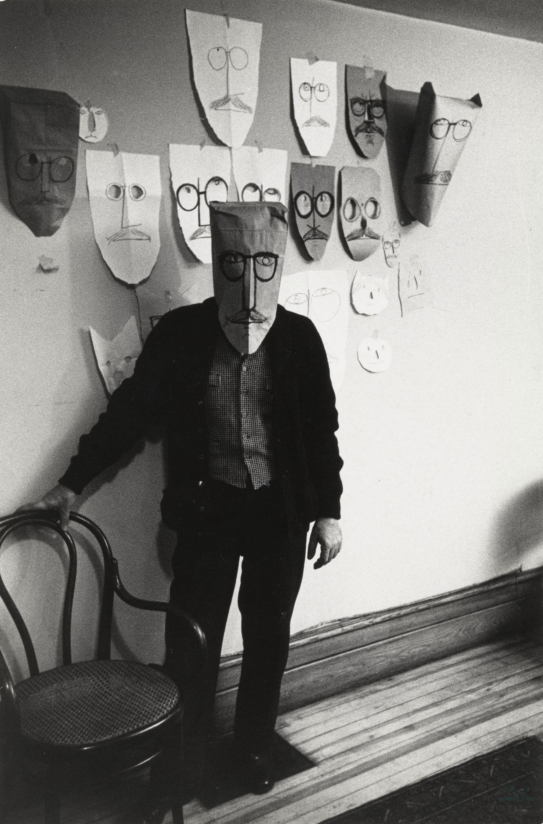 Inge Morath - Saul Steinberg with Masks, New York