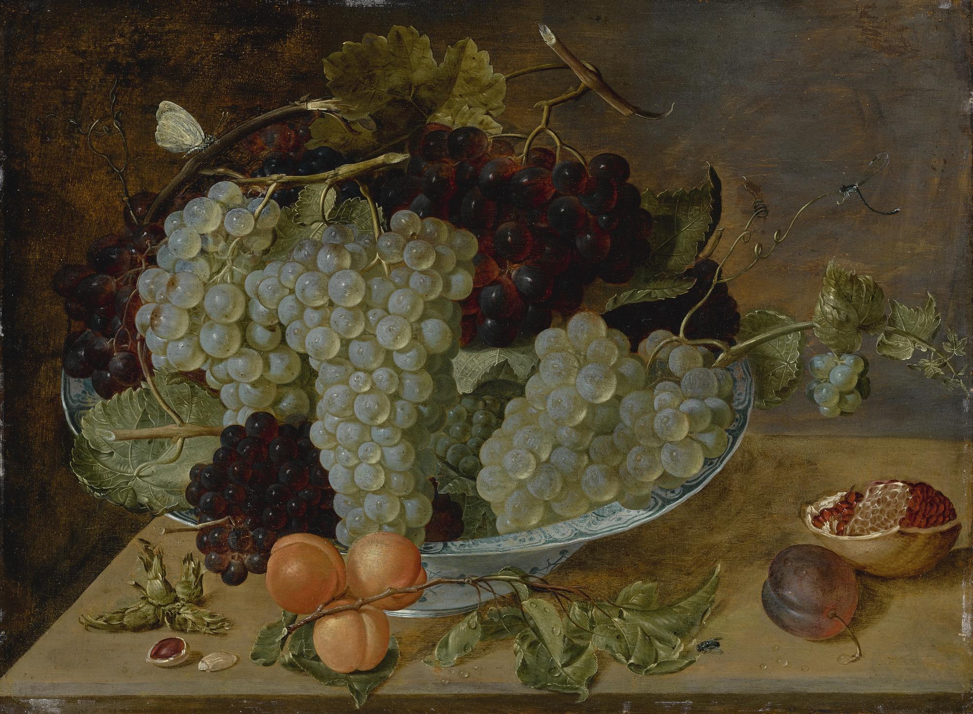 Isaak Soreau - Still Life Of Grapes, Peaches, And A Pomegranate On Stone Ledge