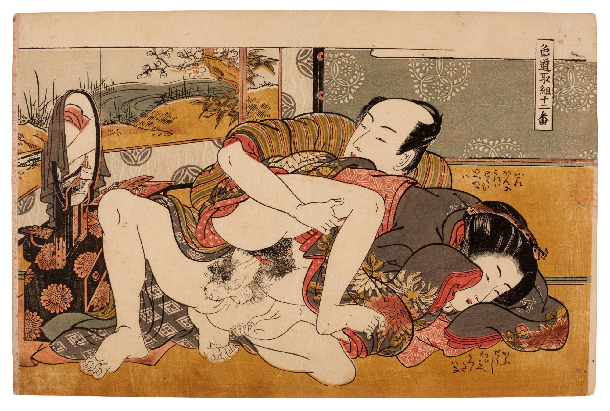 Isoda Koryusai - An amorous couple before a mirror