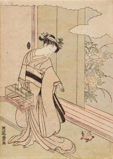 Isoda Koryûsai - Chûban. A beauty encouraging a bird into a cage