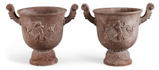 Ivar Johnsson - A pair of Ivar Johnsson cast iron urns \'Faunurnan\' for Näfveqvarns bruk.