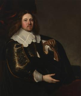 Jacob Adriaensz. Backer - Portrait of a gentleman, half-length, wearing a brocaded doublet, before a red velvet curtain
