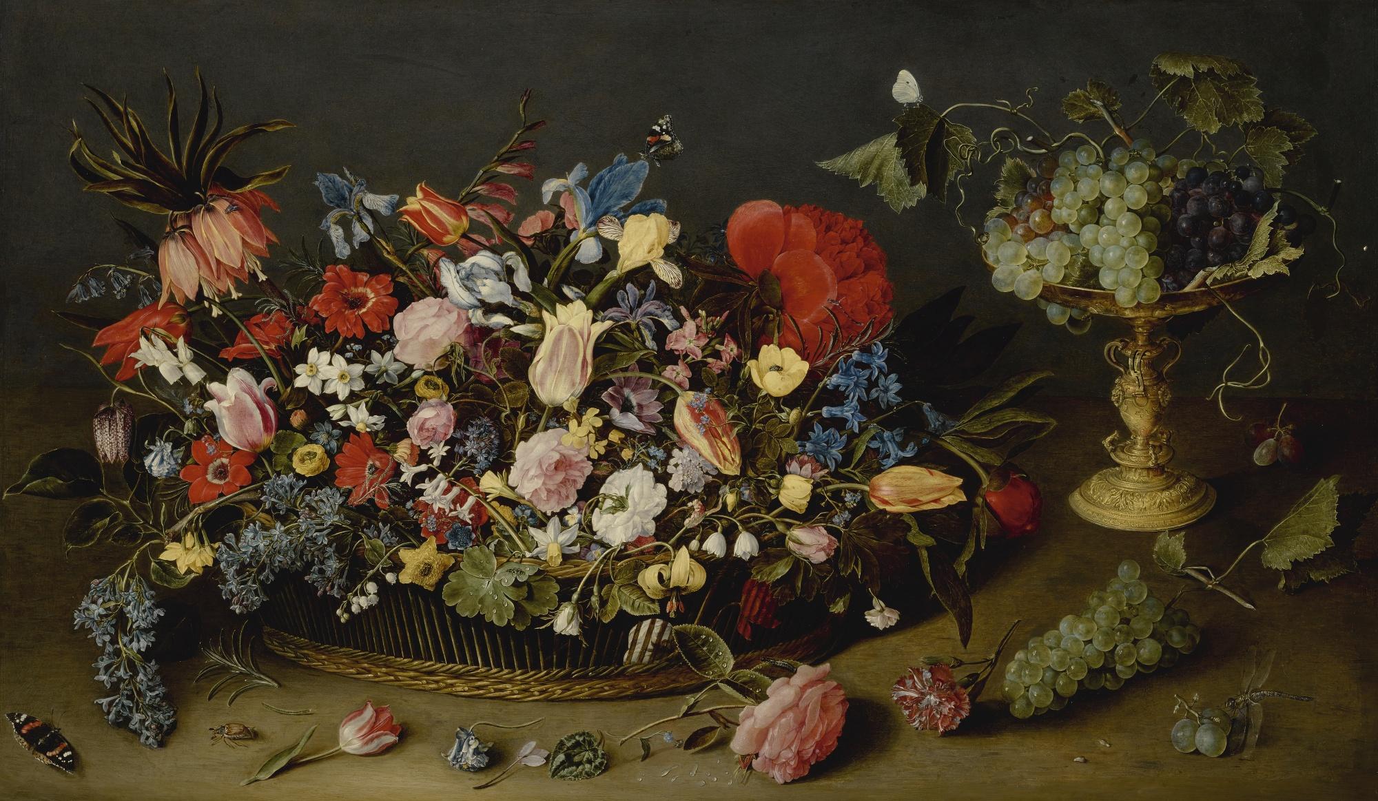 Jacob van Hulsdonck - An Elaborate Basket Of Flowers And A Tazza With Grapes, On A Table Top