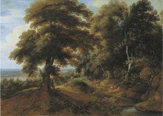 Jacques D\'Arthois - A wooded landscape with elegant figures on a path