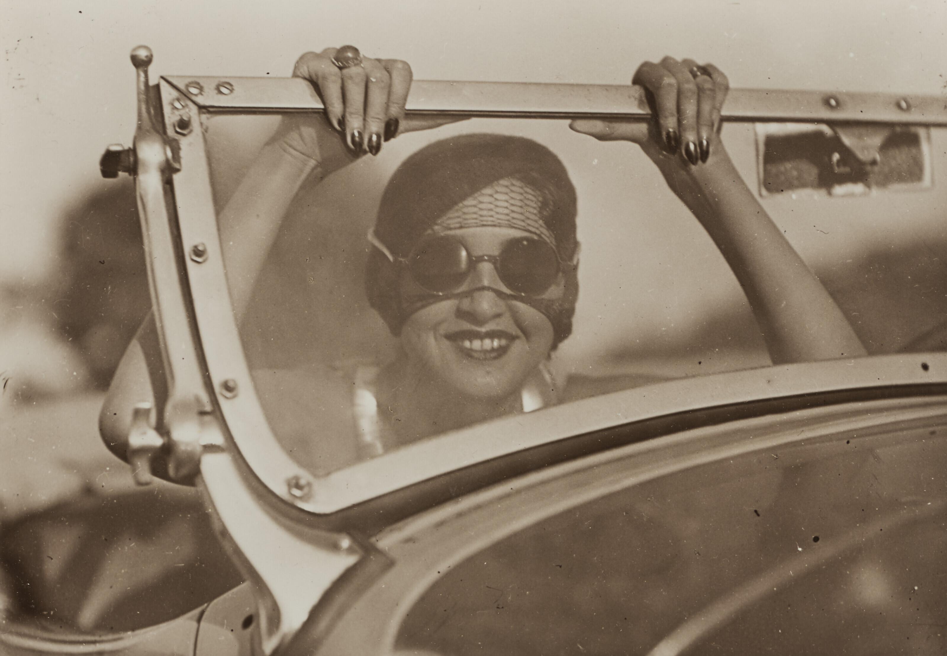 Jacques Henri Lartigue - Renée Perle with Motoring Goggles, c. 1930-1932