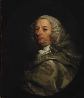 James Latham - Portrait of a gentleman, half-length, in a silver brocaded mantle, in a painted oval