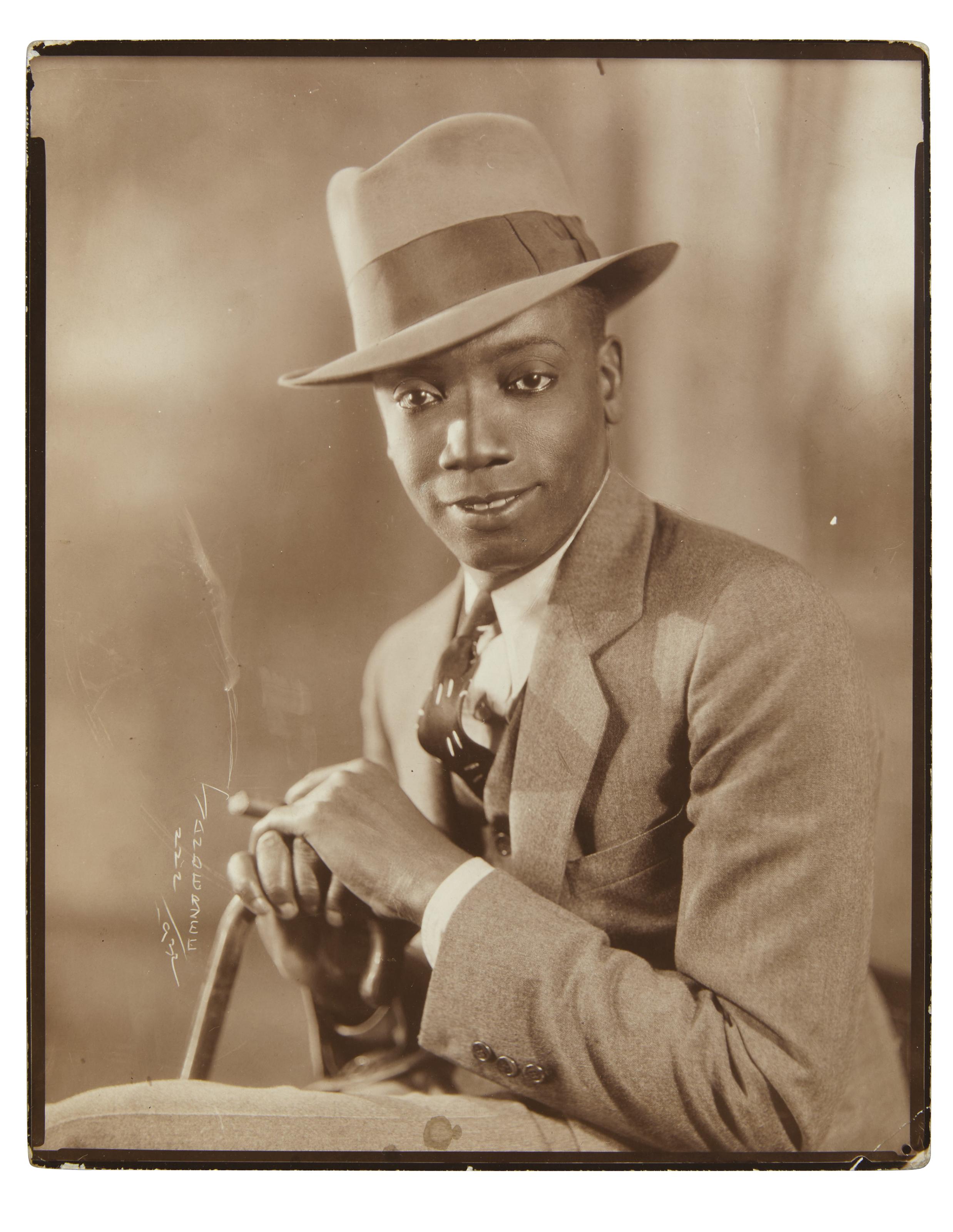 James Van Der Zee - Elegant young man with cigar, 1932