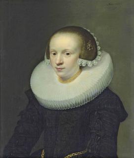 Jan Anthonisz. van Ravesteyn - Portrait of a lady, half-length, in a black dress with a ruff, gold chains around her neck and waist, lace headdress and a jewel in her hair