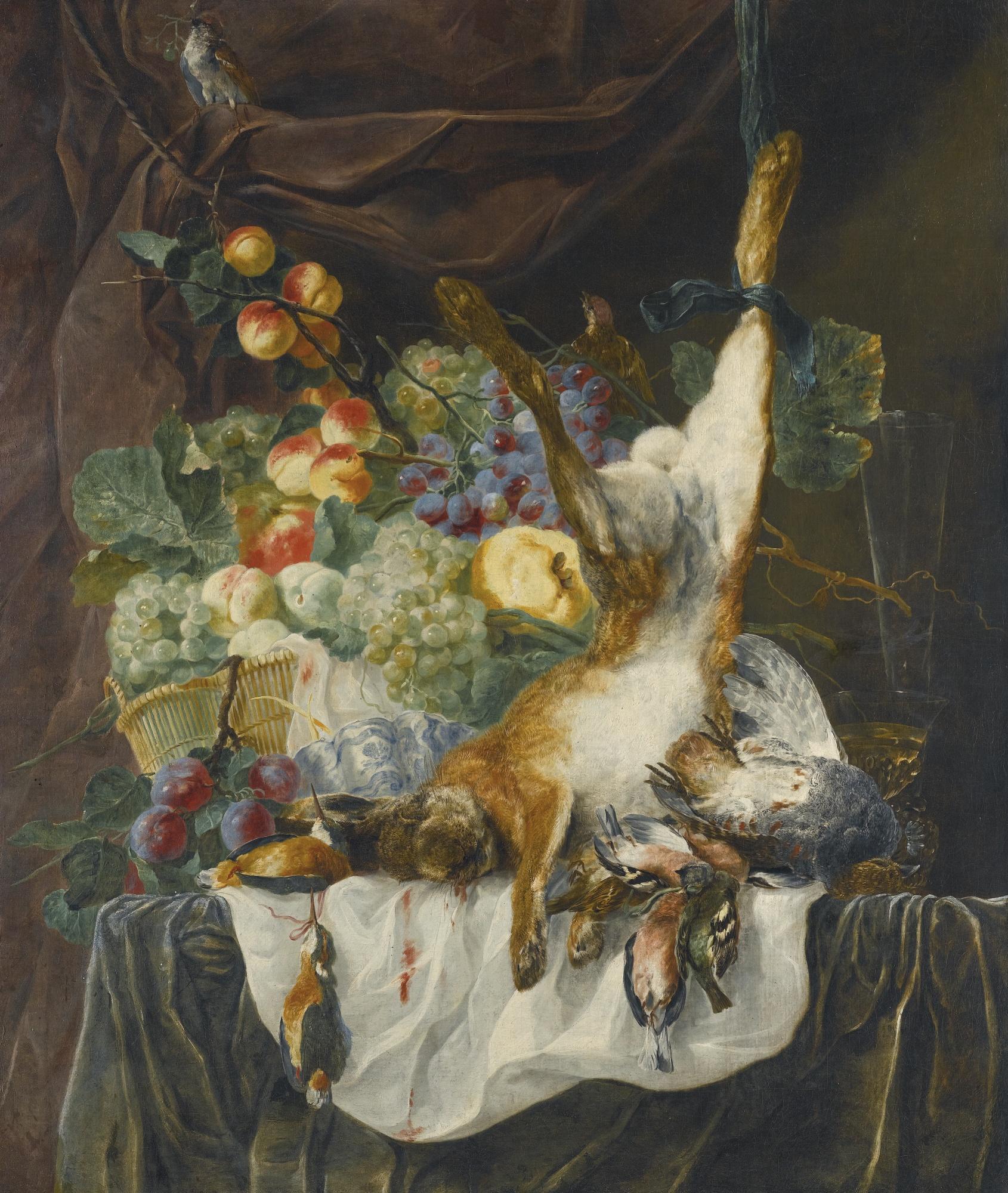 Jan Fyt - Still Life Of A Hare, Game And Songbirds Before A Still Life Of Fruit In A Basket, All Upon A Ledge Draped With A Green And White Cloth, With Glassware